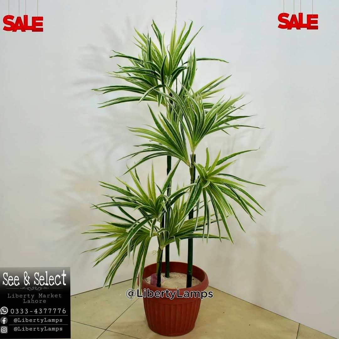 tall metallic pedestal planter with palm
