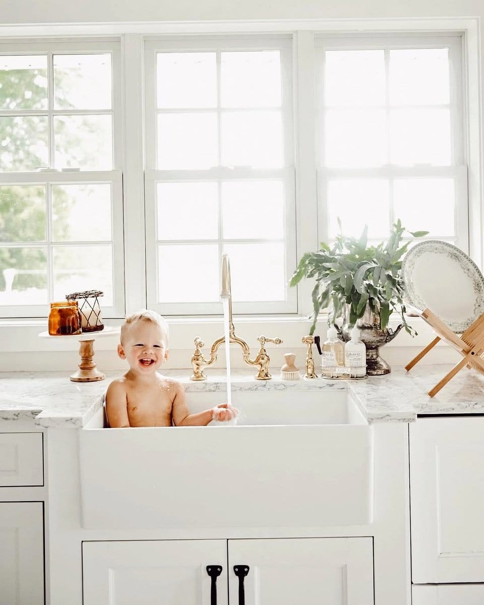 clawfoot bathtub sink with mixed plants