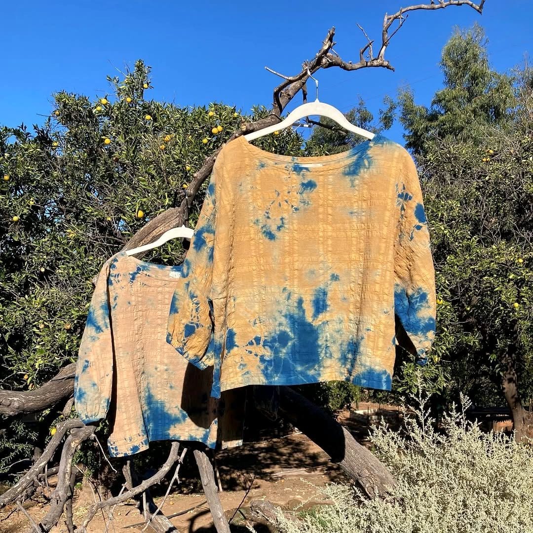 Fabric dipped in indigo dye bath