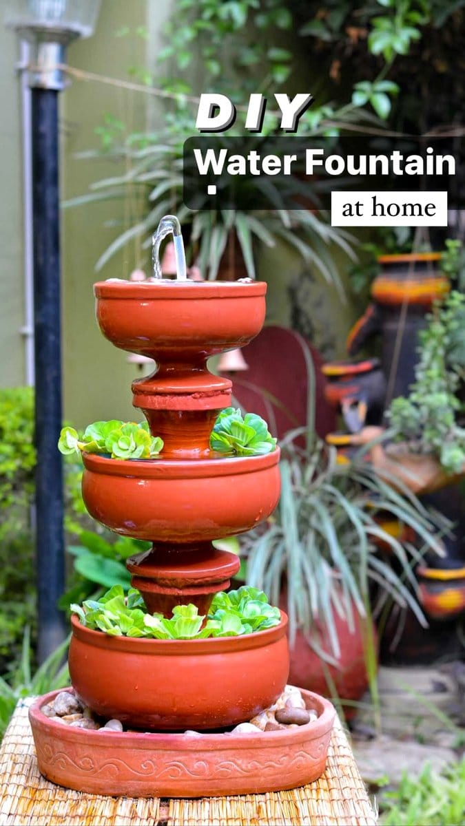 weathered terracotta planter with water feature
