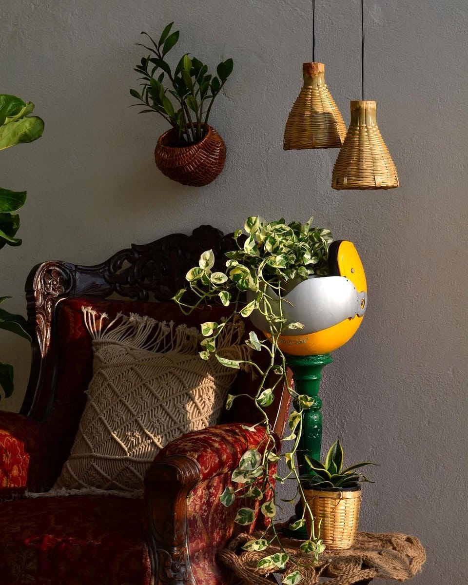 Marble pots alongside wooden and metal decor