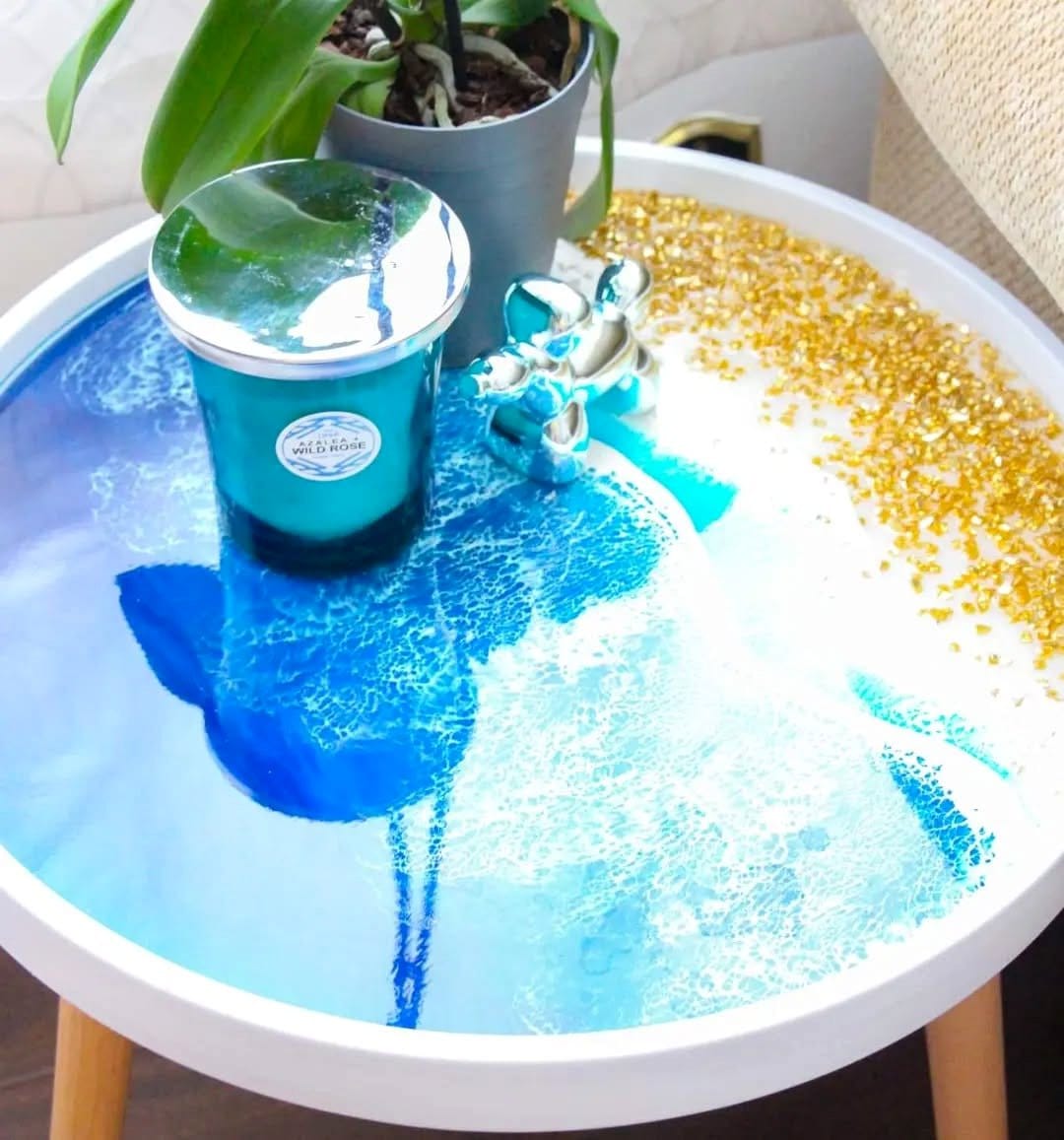 beach-themed cable spool table with seashells