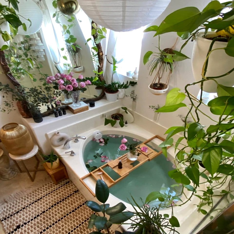 Serene bathroom with jade plants and candles