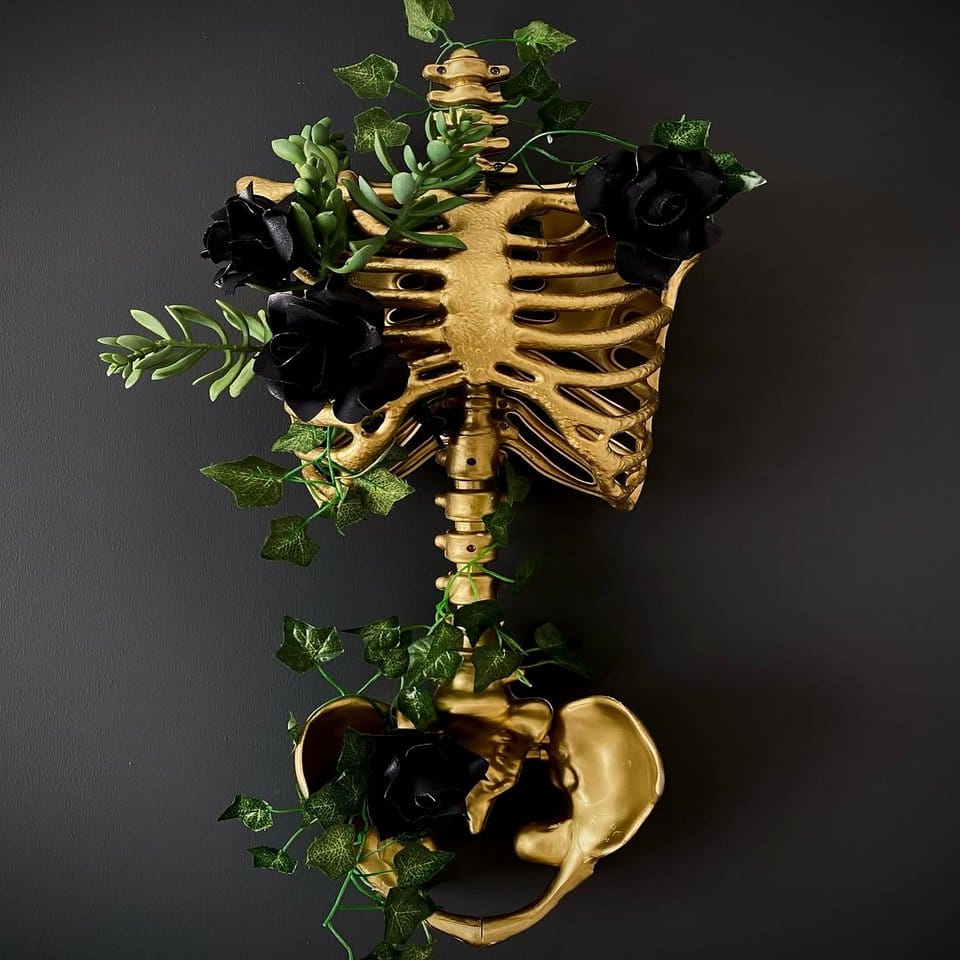 Skull planter with dark roses