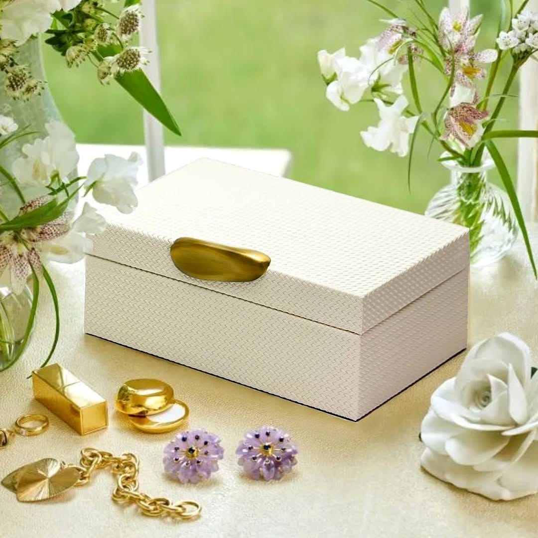 sleek leather storage boxes with brass accents