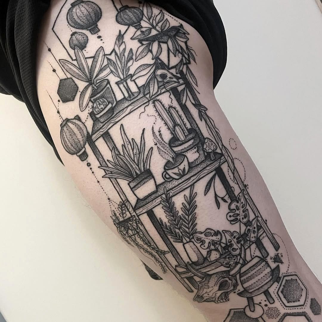 Metal plant stands with etched tattoo patterns