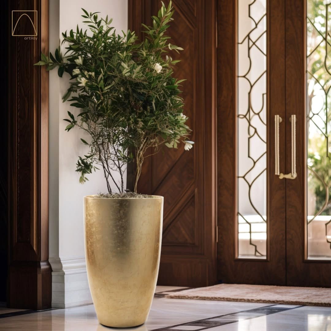 Elegant gold-dipped ceramic planters with Ethiopian coffee plants