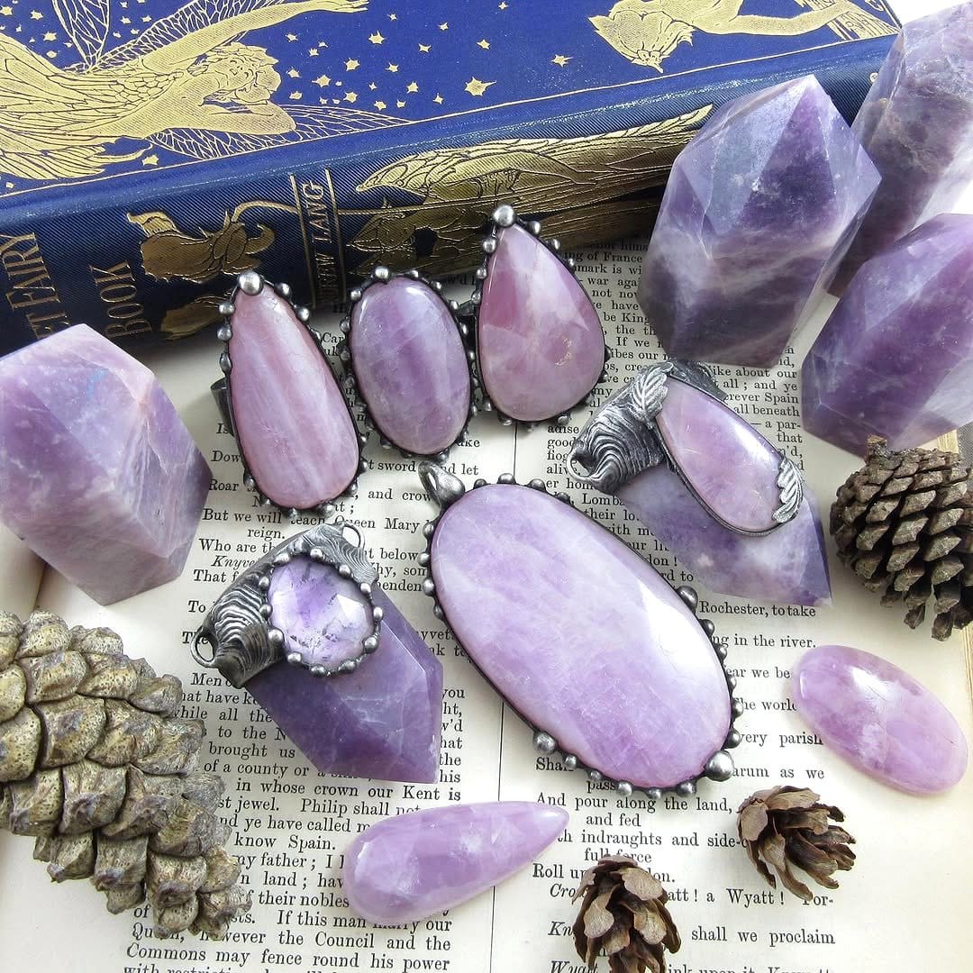 amethyst crystal beside plant