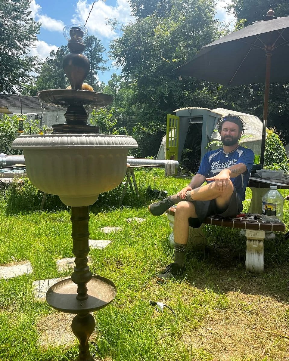 vintage birdbath repurposed as water feature