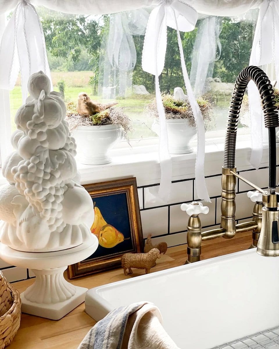rustic farmhouse sink with succulents