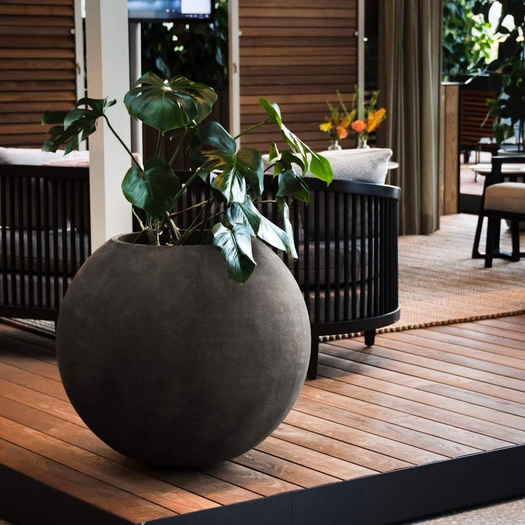 Stone-like fiberglass plant pots