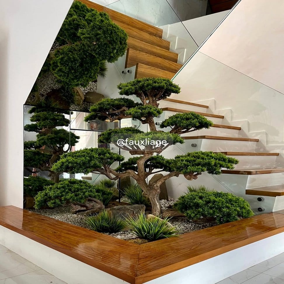 Bonsai tree with decorative rock stack