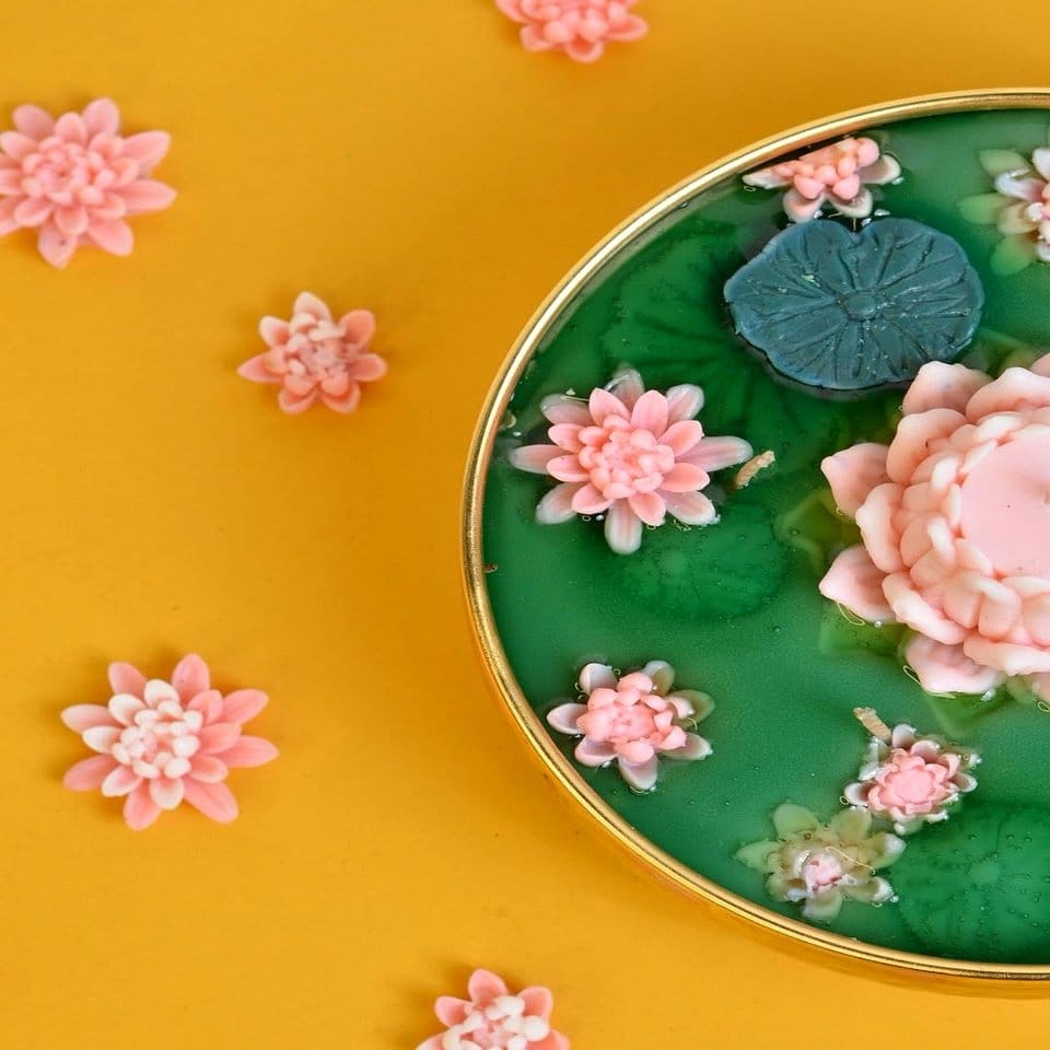 Elegant floating candle and water lily centerpiece