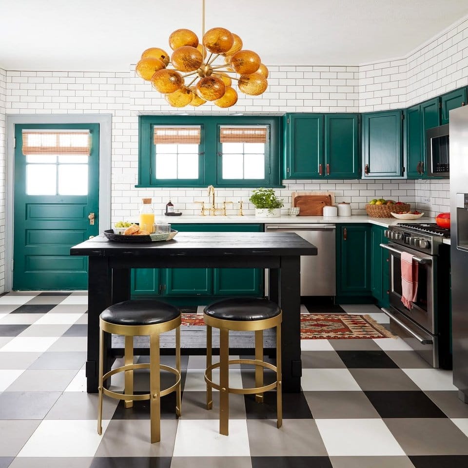 Black-and-white checkered floor tiles with potted plants