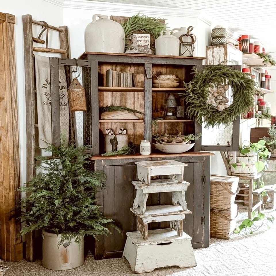 Rustic wooden shelf with flannel-wrapped pots