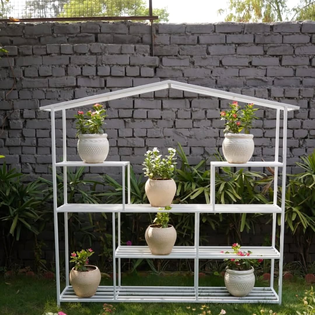 Circular plant stand with geometric pots