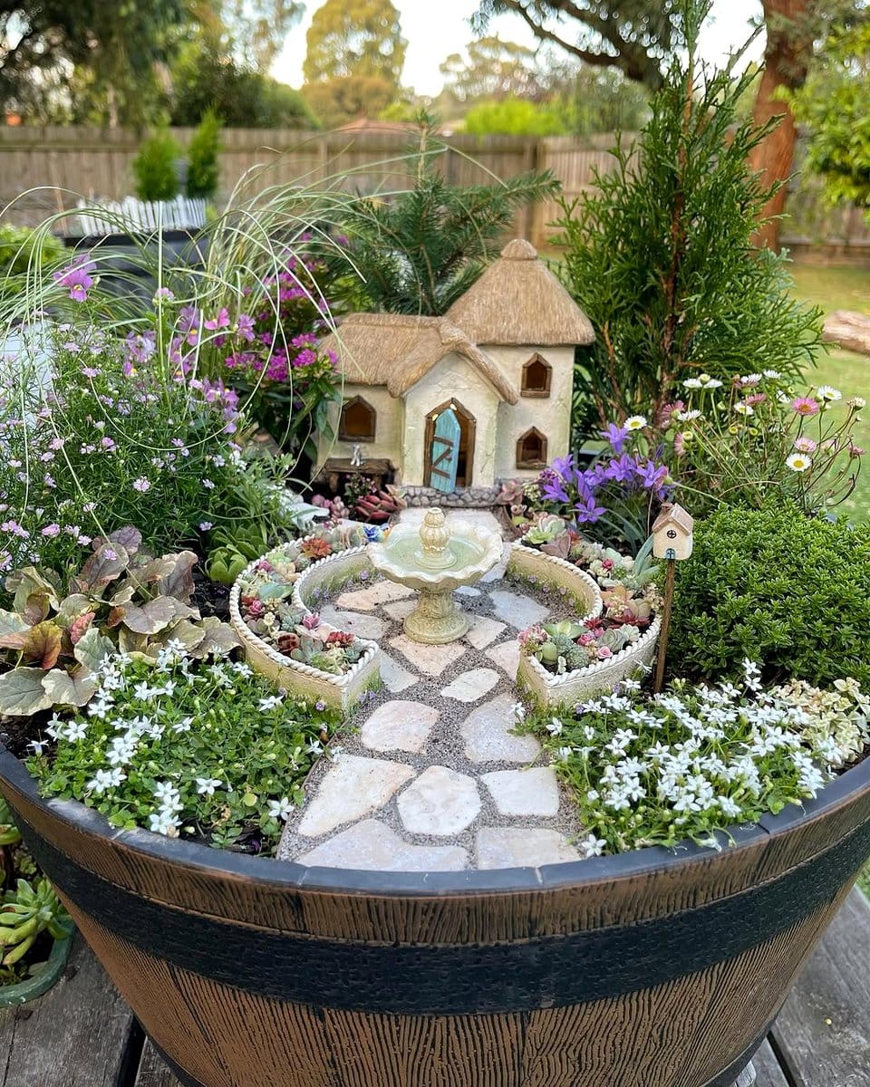 miniature fairy garden in fountain