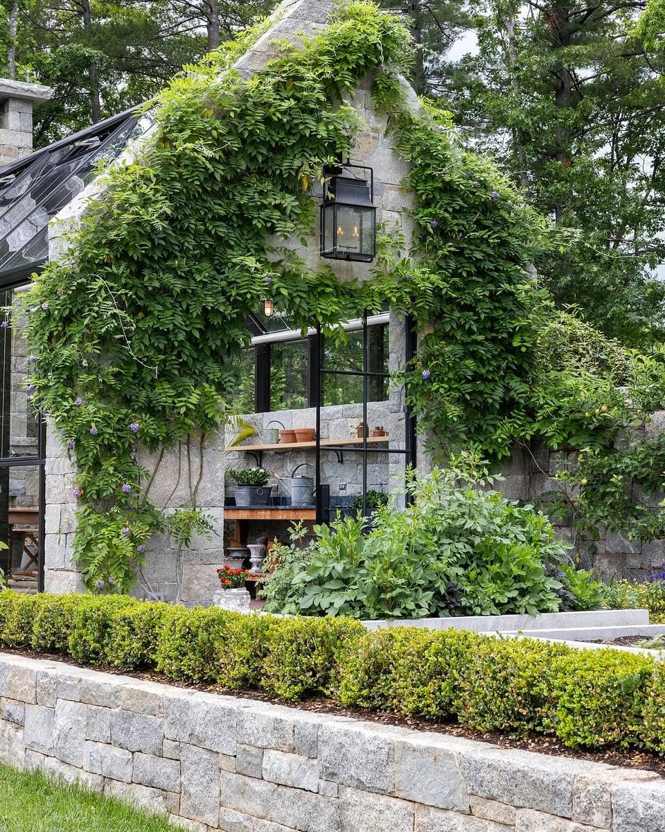vertical garden beside large mirror