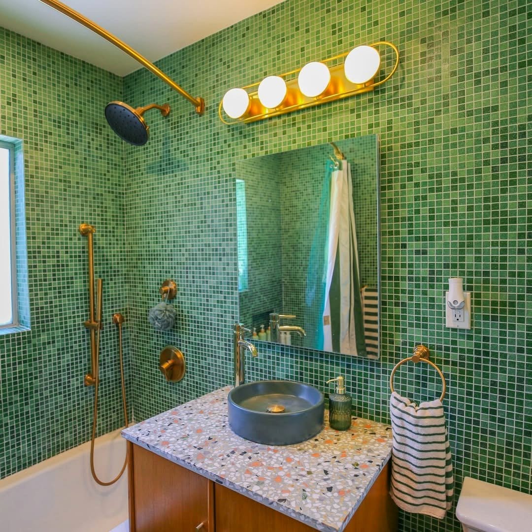 mosaic-tiled bathtub planter