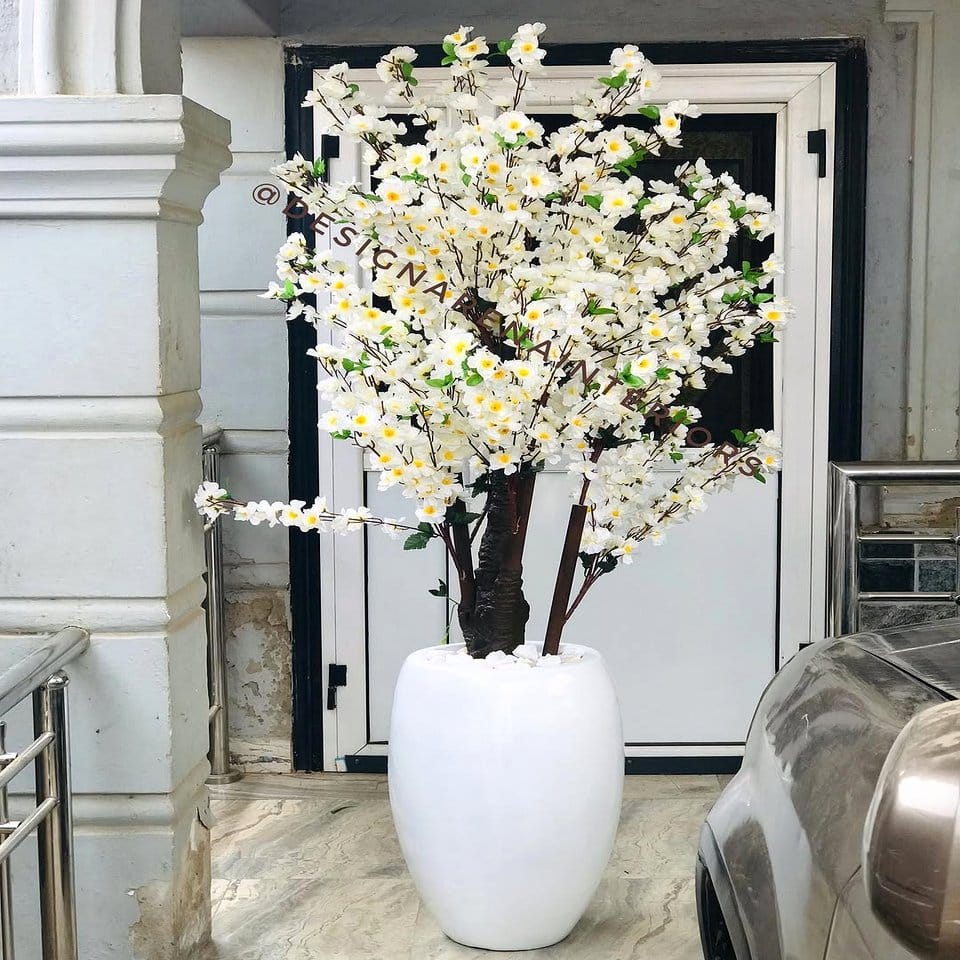 Cherry blossom motif plant pots with delicate designs