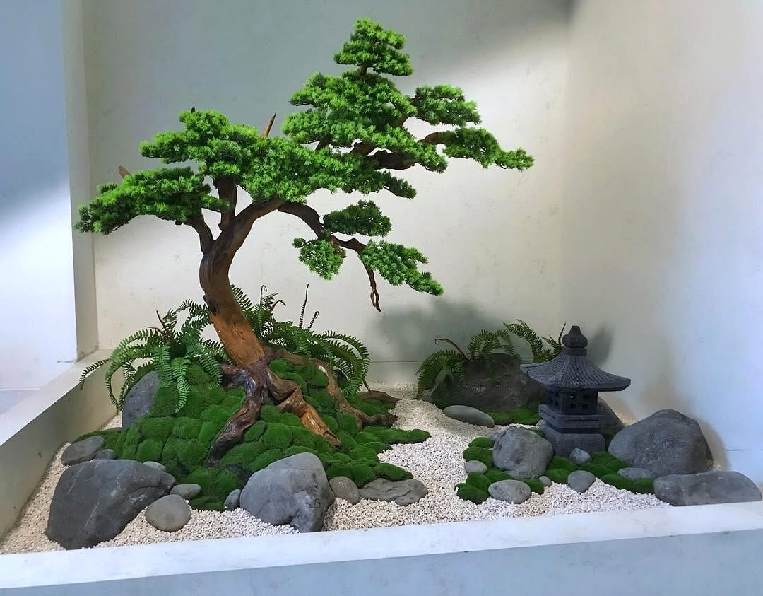 Zen-inspired obsidian bonsai garden