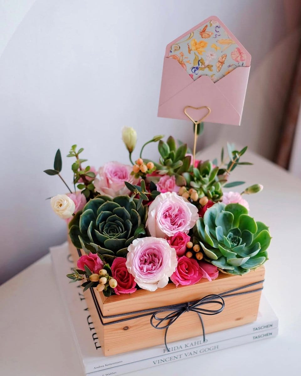 wooden crates with mixed plants