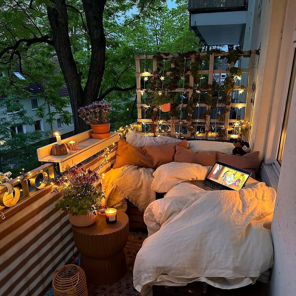 Cozy balcony with citrus plants and cushions