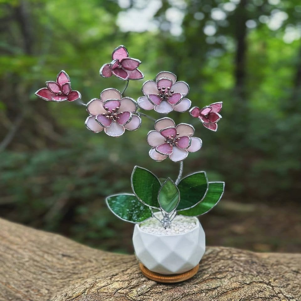 Stained glass windowsill planter with violets