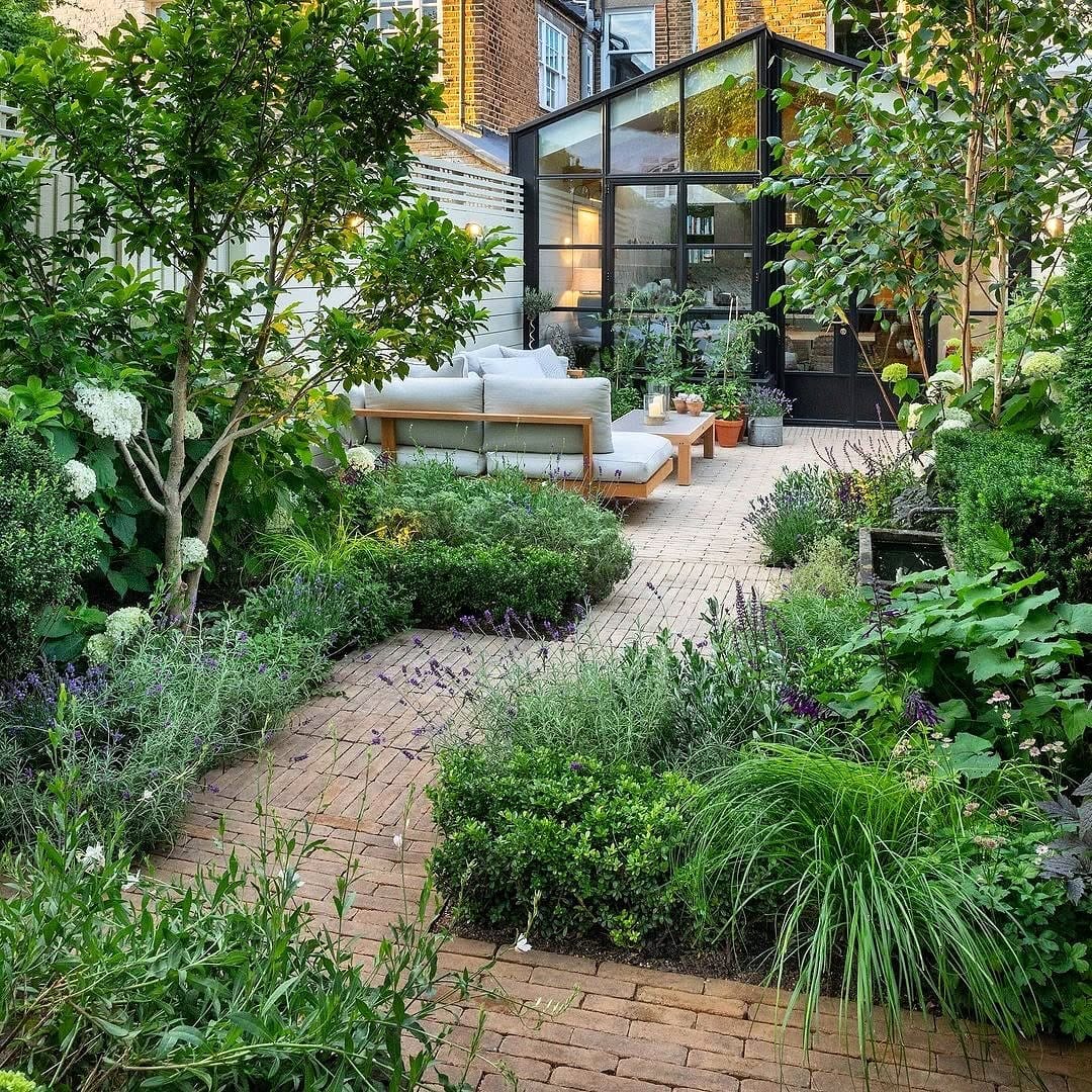 Outdoor pathway with lava rocks and plants