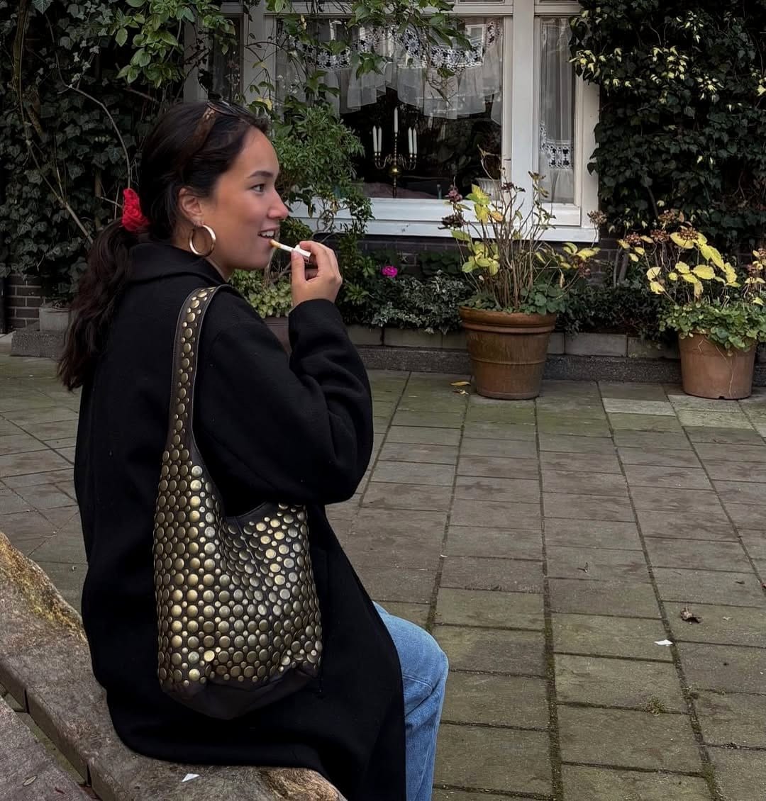 Portable leather plant bag with studs