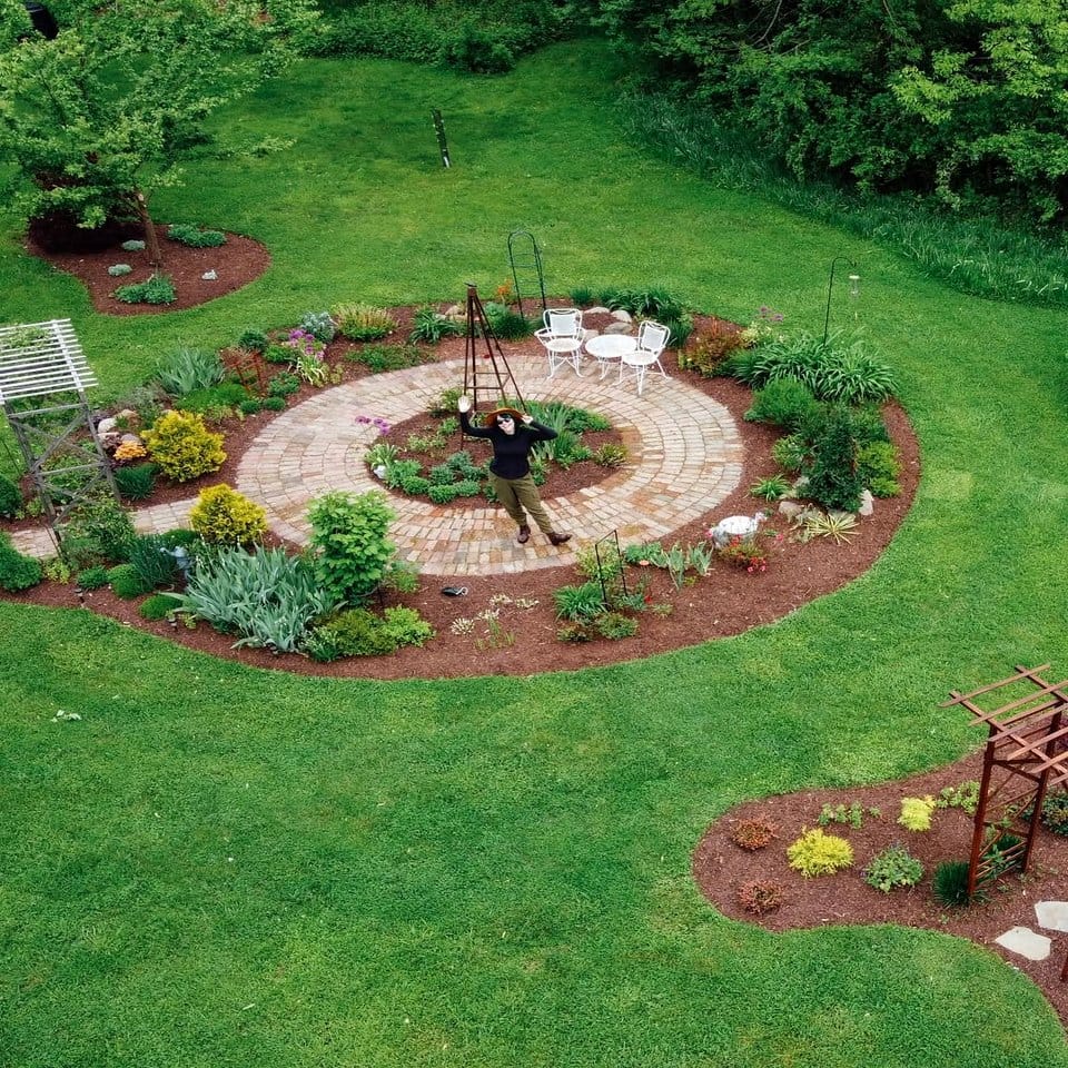 Garden path with stained glass and plants