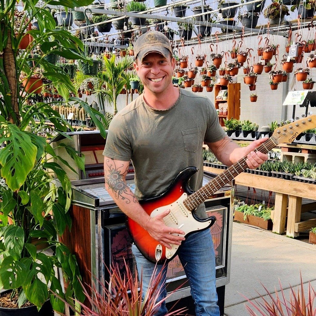 string lights around guitar planter
