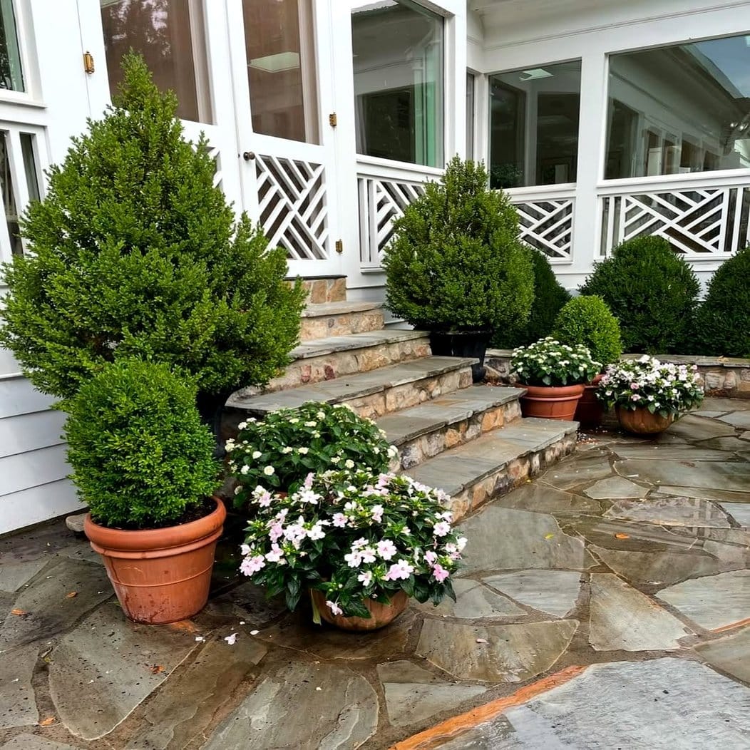 Outdoor patio with flannel-wrapped plant pots