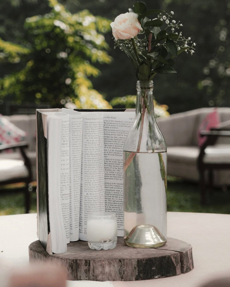 typewriter with daisies on dining table