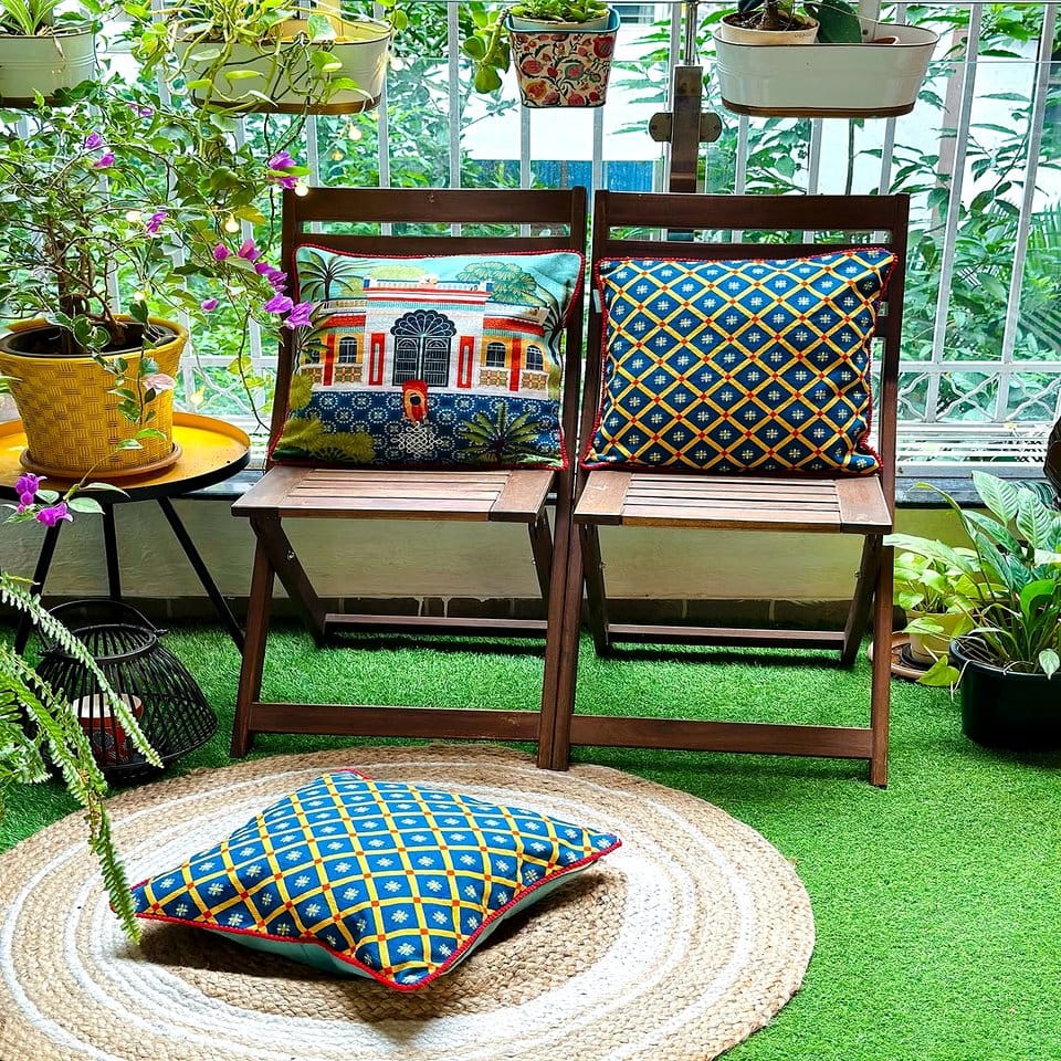 Stylish patio with citrus plants and wicker furniture