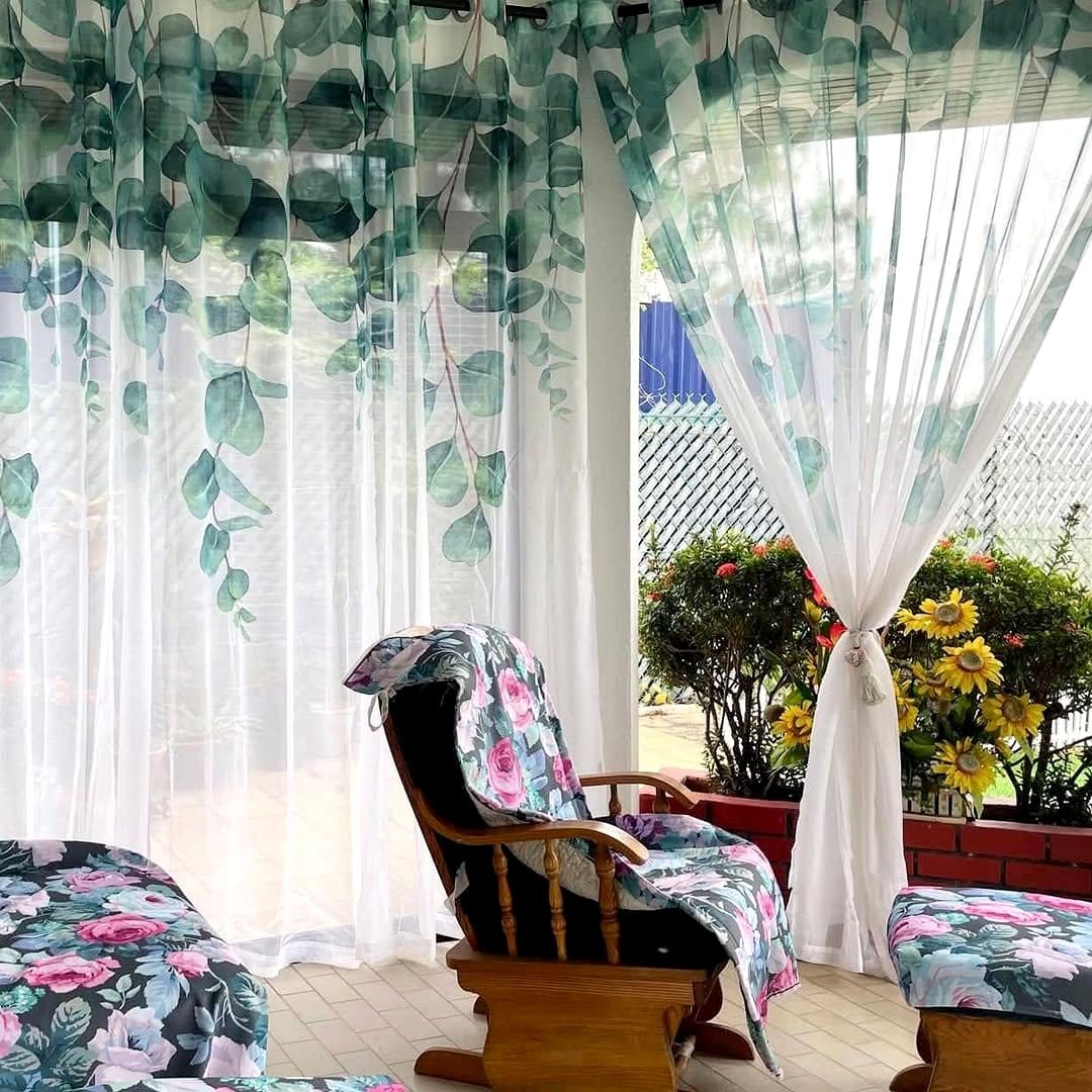 sheer patterned curtains on window