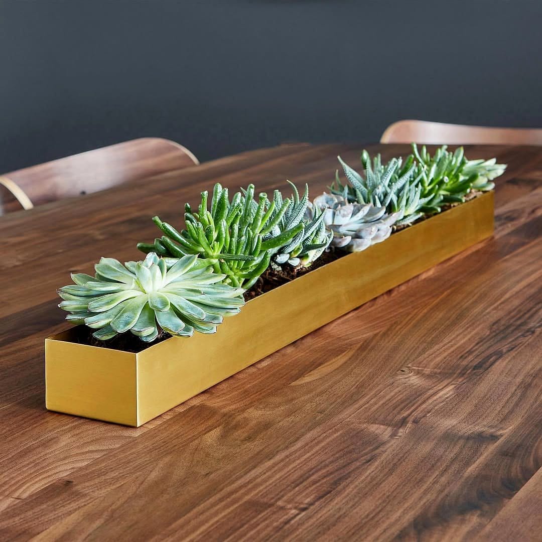 metal and wood planter with succulents