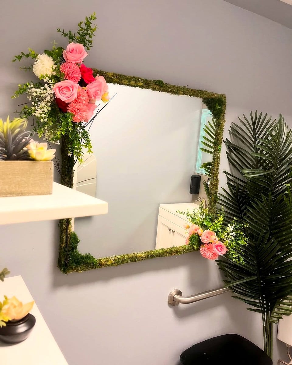 large mirror reflecting plants