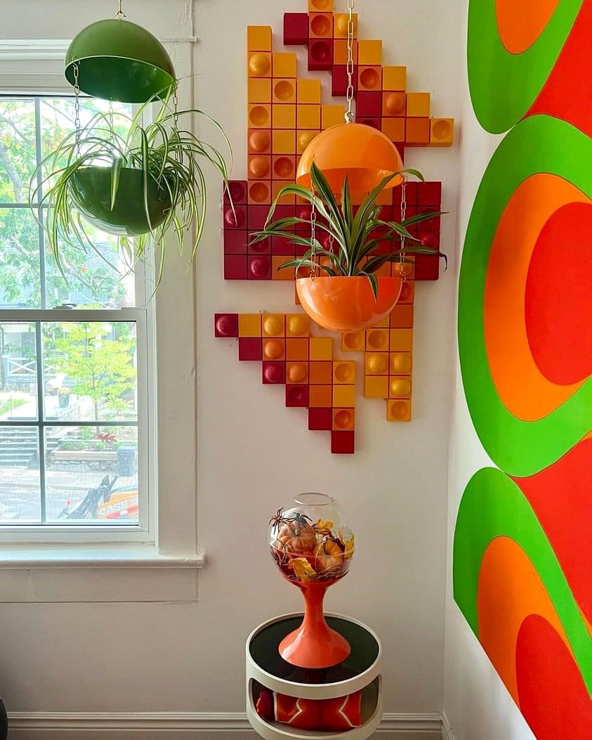 Eclectic decor with lava lamp and mosaic planters
