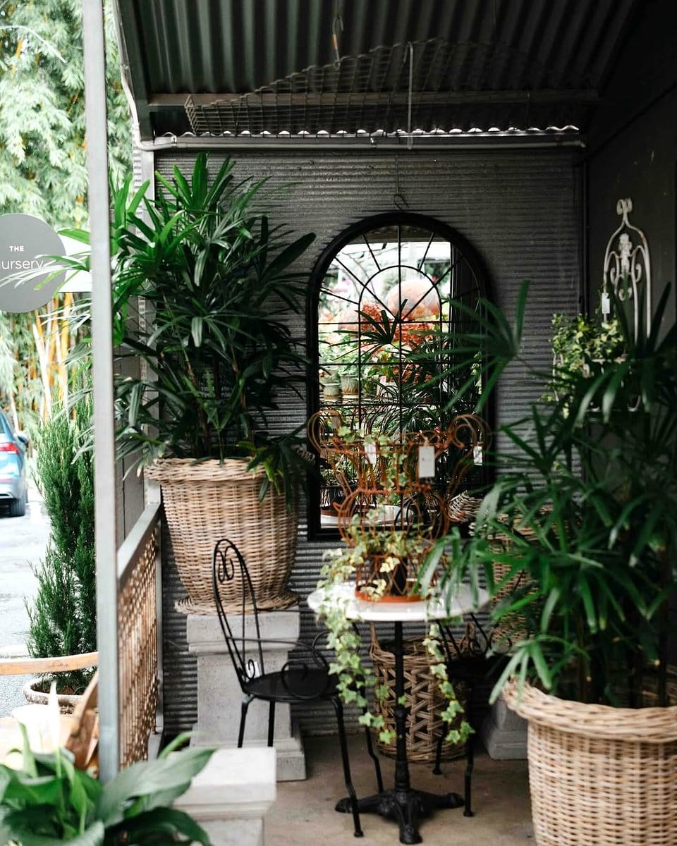 outdoor patio with mirror and plants