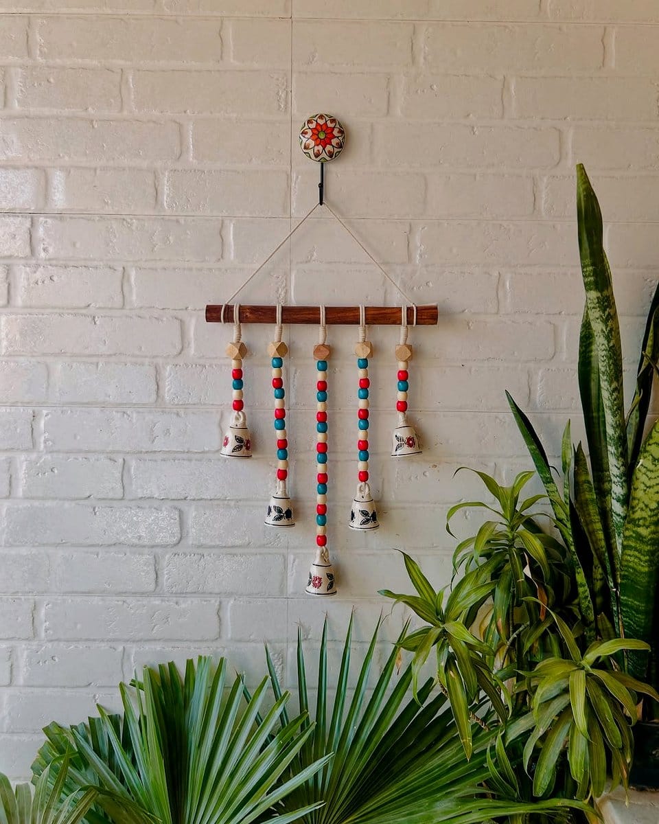 Handcrafted wooden wind chime plant hanger