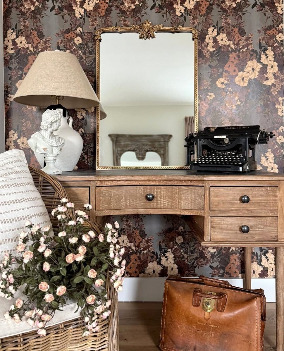typewriter with eucalyptus on fireplace mantel
