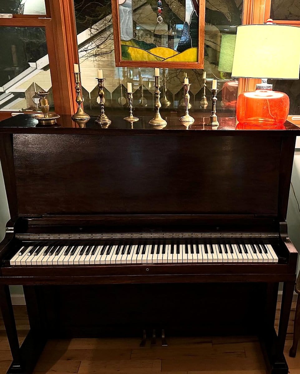 rustic piano planter with wooden accents