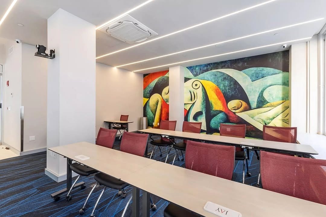 conference room with green-themed artwork