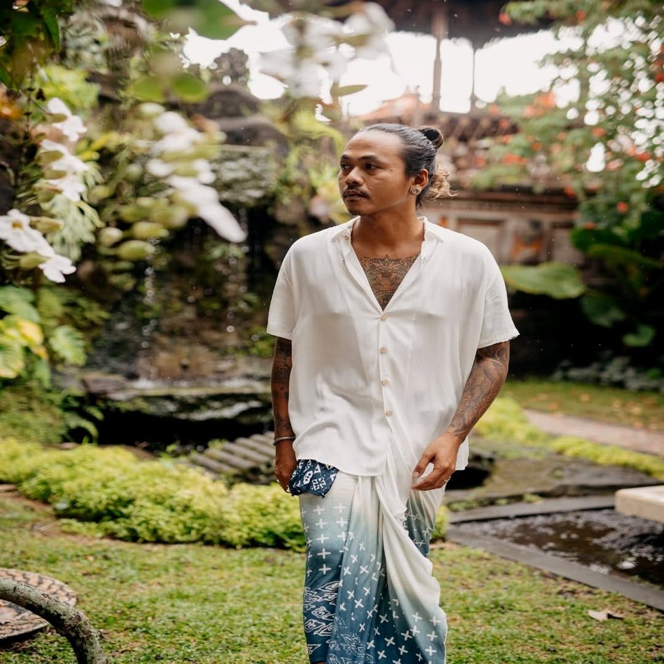 Tree trunks artistically wrapped in Javanese Batik fabric