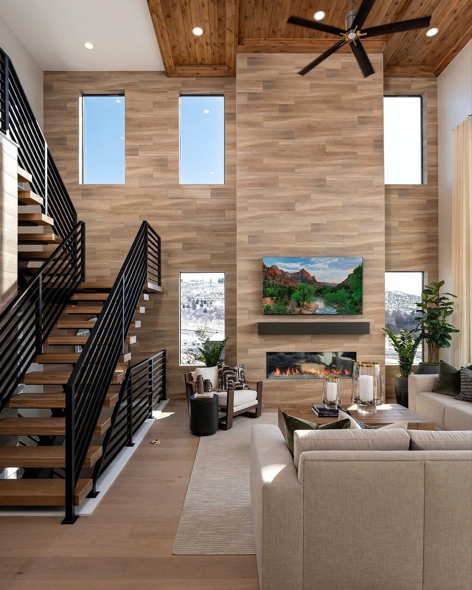 Spacious open-concept living room with large windows