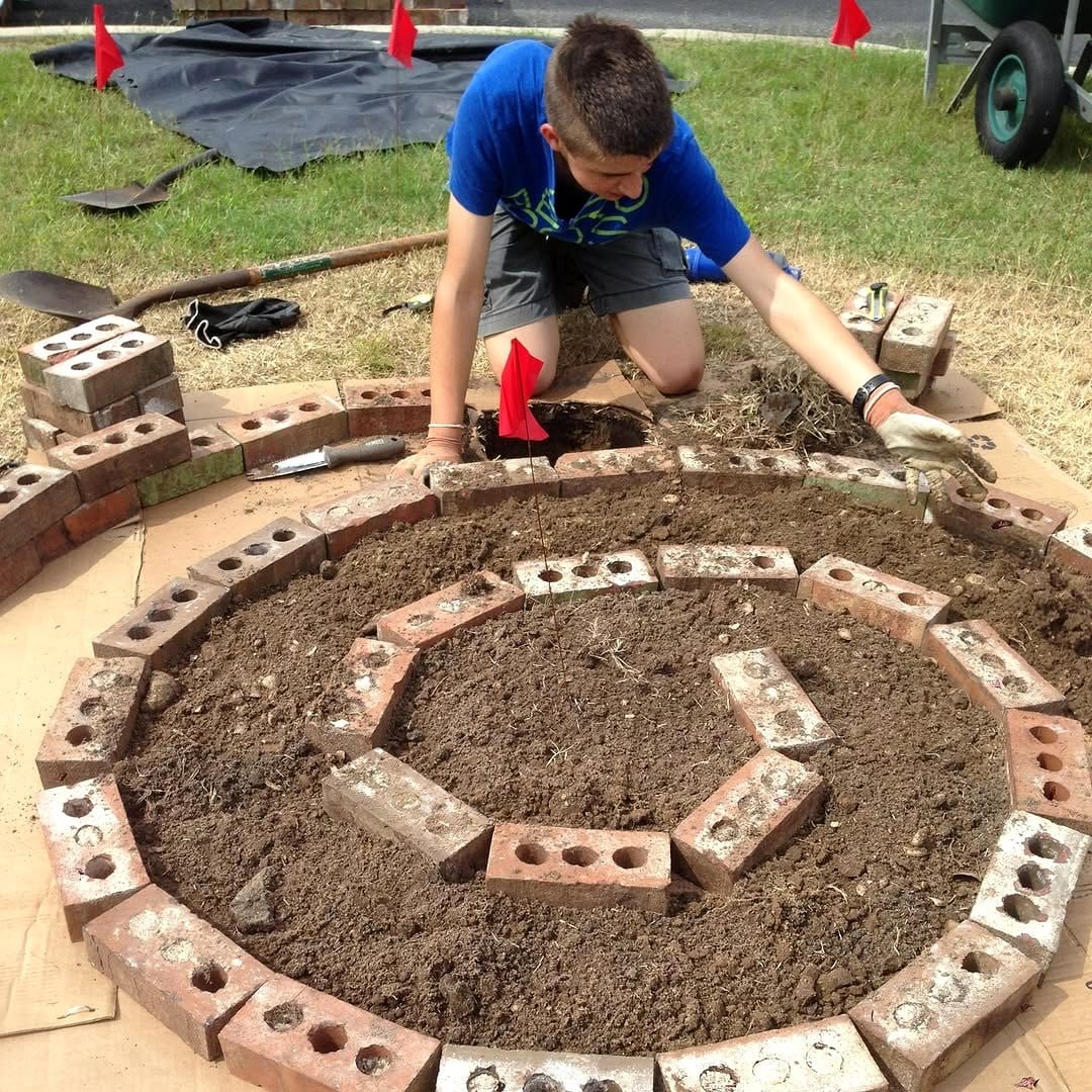 stone herb spiral in garden