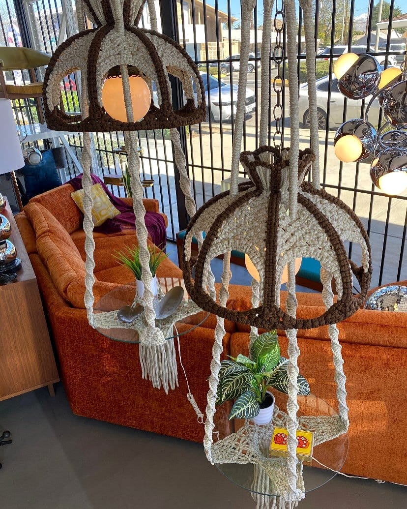 rope lights woven around plant stand