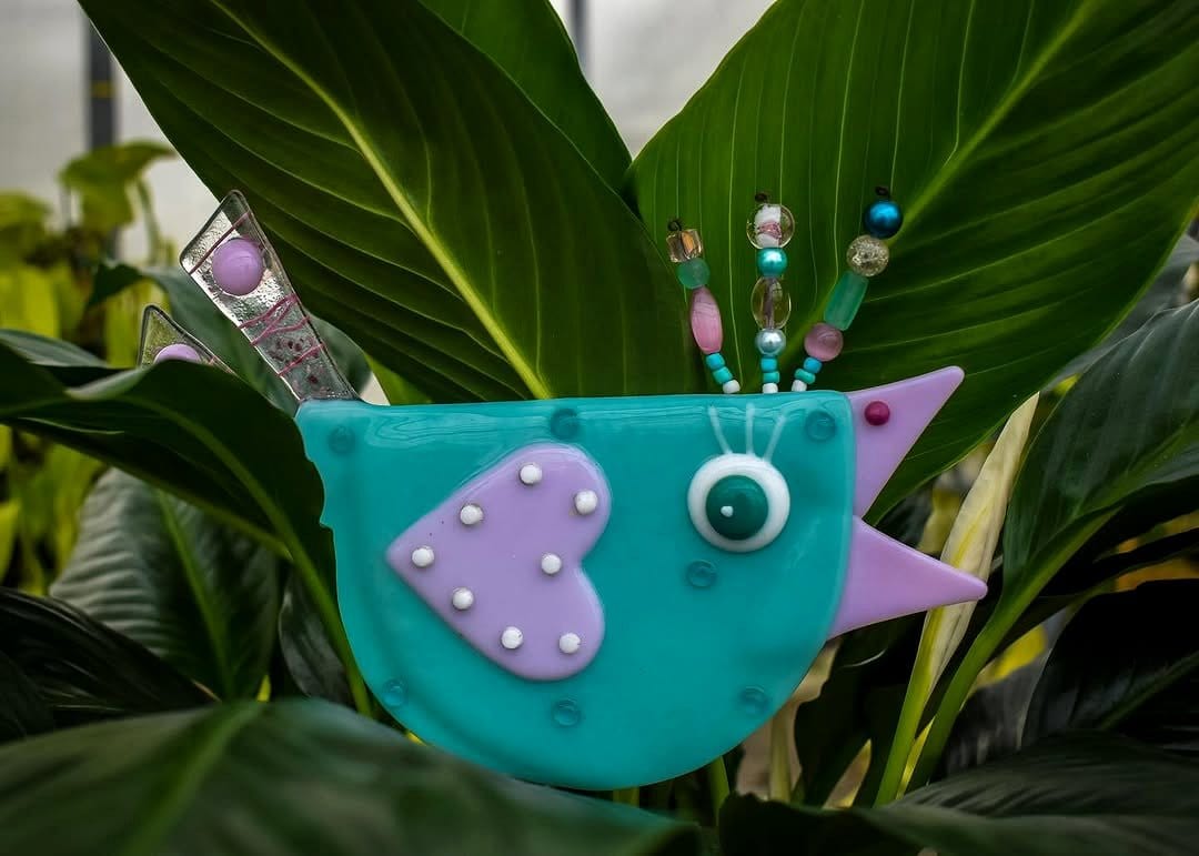 Herb-filled wind chime plant hanger