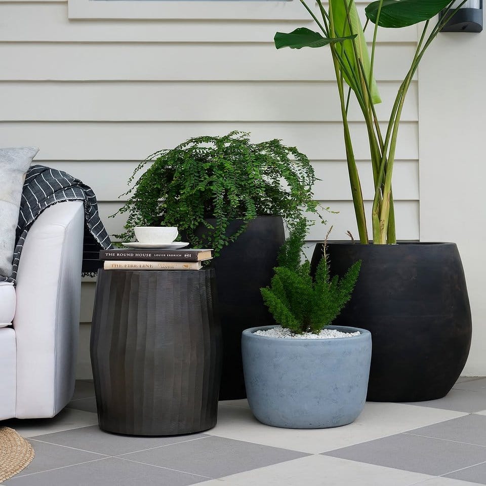 Outdoor patio with clay pots and Nordic-style furniture